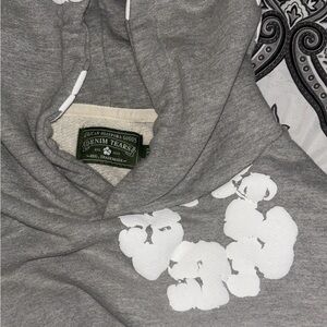 Denim Tears Gray Hoodie with White Floral Design